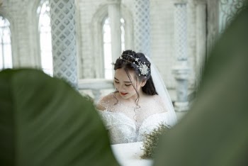 Photo Of Woman Wearing White Wedding Dress