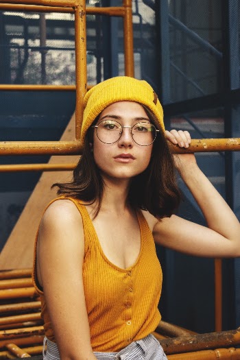 Photo of Woman Wearing Yellow Beanie