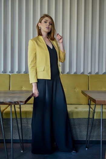 Photo of Woman Wearing Yellow Blazer