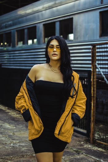 Photo Of Woman Wearing Yellow Jacket