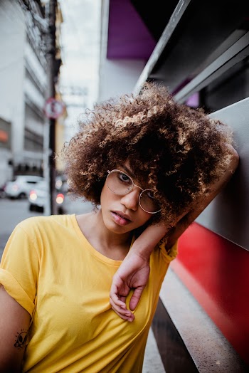 Photo of Woman Wearing Yellow Shirt