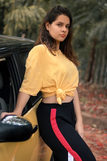 Photo of Woman Wearing Yellow Shirt