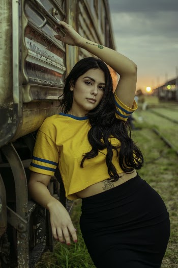 Photo of Woman Wearing Yellow Shirt