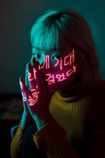Photo Of Woman Wearing Yellow Sweater
