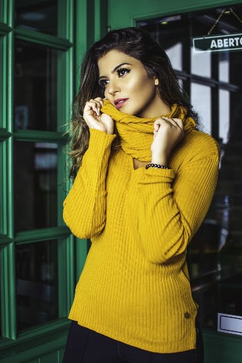 Photo Of Woman Wearing Yellow Sweater