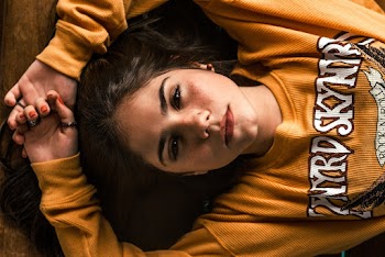 Photo of Woman Wearing Yellow Sweater