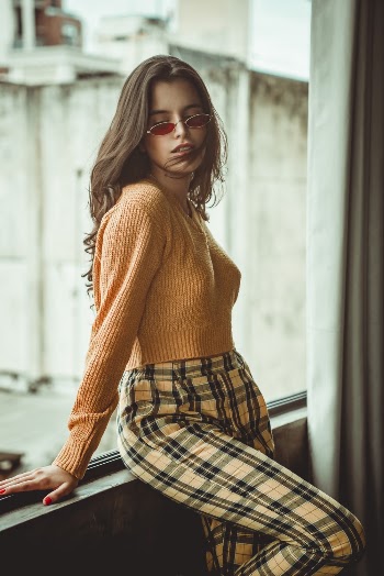 Photo of Woman Wearing Yellow Sweater