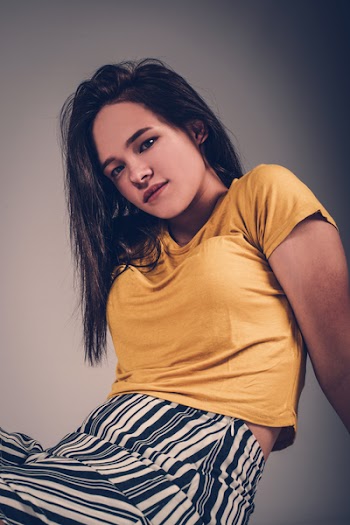 Photo of Woman Wearing Yellow Top