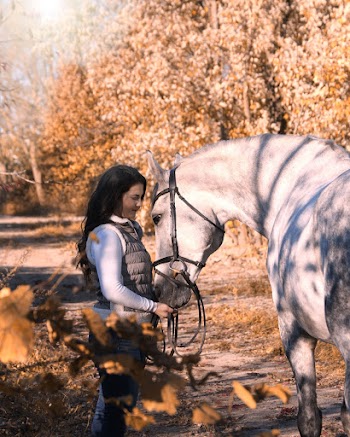 Photo of Woman With A Horse