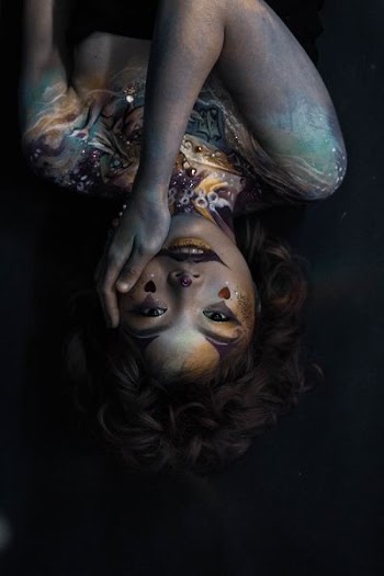 photo of woman with body paint