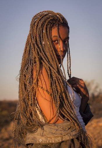 Photo Of Woman With Braided Hair