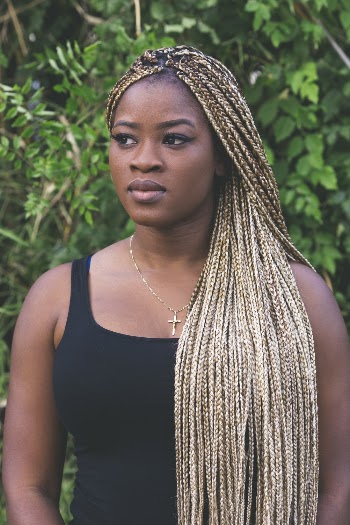 Photo of Woman With Braided Hairstyle