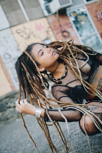 Photo of Woman With Deadlocks