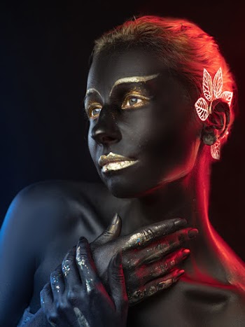 Photo of Woman With Face and Body Paint