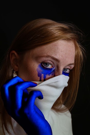 Photo Of Woman With Face Paint 