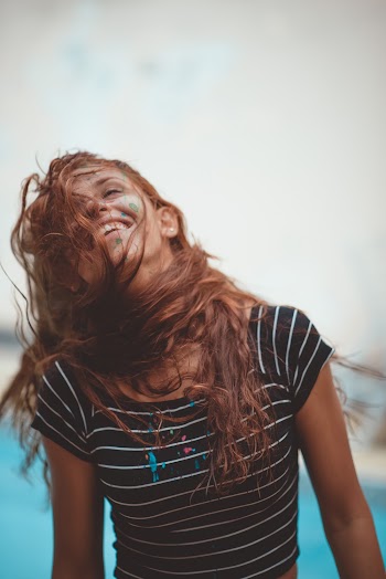 Photo of Woman With Paint On Here Face