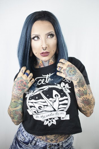 Photo of Woman With Tattoos