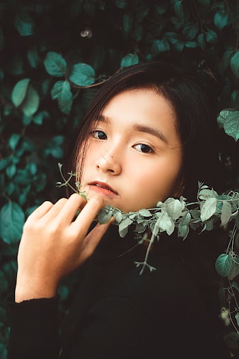 Photo Of Women Holding A Plant