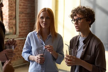 Photo Of Women Holding Beverage