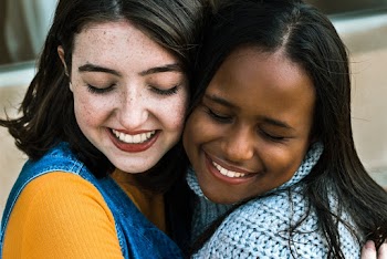 Photo Of Women Hugging Each Other