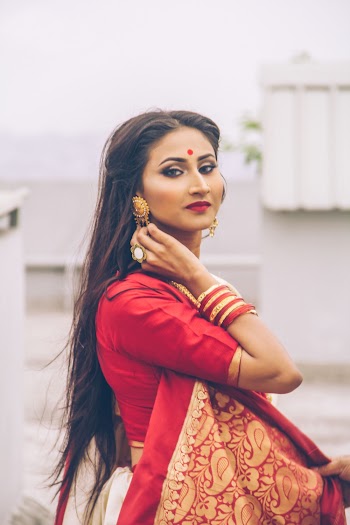Photo of Women in Red Saree Dress Posing