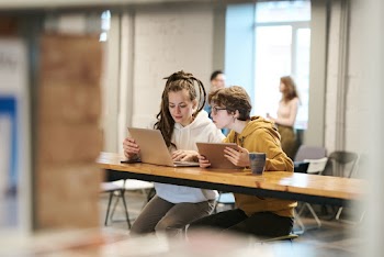 Photo Of Women Looking On Laptop