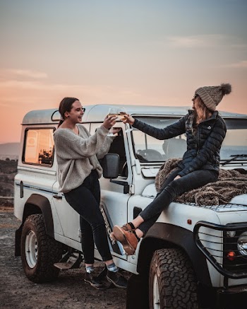 Photo Of Women On White SUV