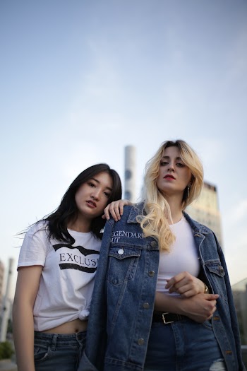 Photo Of Women Standing Near Each Other