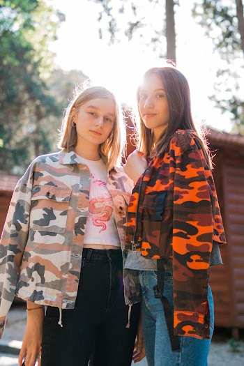Photo Of Women Wearing Camouflage Jacket