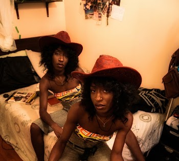 Photo Of Women Wearing Cowboy Hat