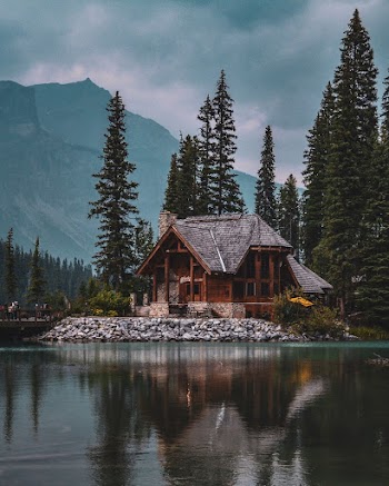 Photo of Wooden House Near Lake