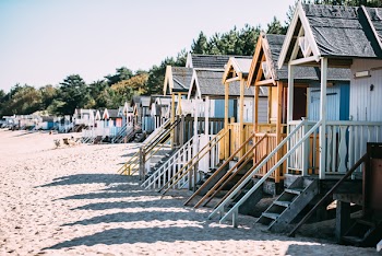 Photo of Wooden Huts on the Beach