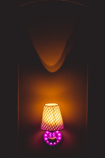Photo of Yellow and Pink Table Lamp Turned on