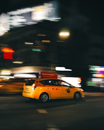 Photo Of Yellow Car On Road