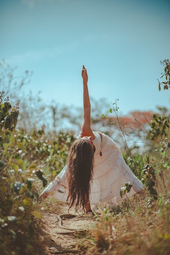 Photo off Woman Wearing White Dress