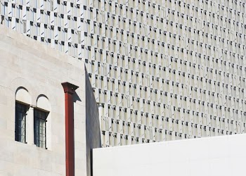 photo ofwhite concrete building