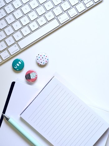 Photo Round Buttons on White Surface