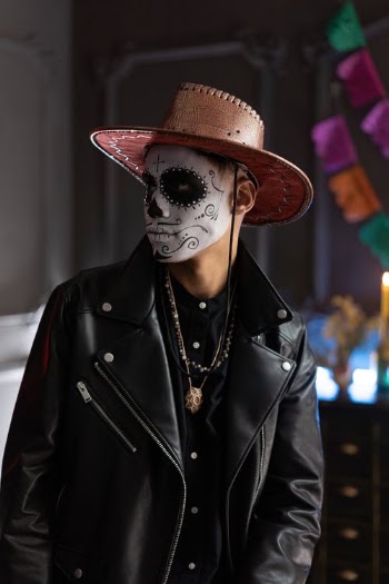 Photograph of a Man with Face Paint Looking Away · Free Stock Photo