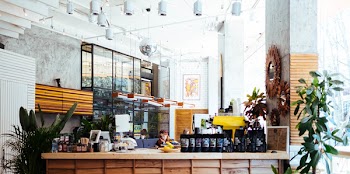 Photograph of a Woman in a Coffee Shop
