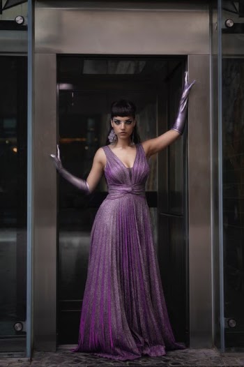 Photograph of a Woman in a Purple Dress Posing  · Free Stock Photo