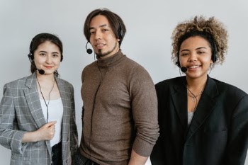 Photograph of Coworkers with Black Headsets · Free Stock Photo