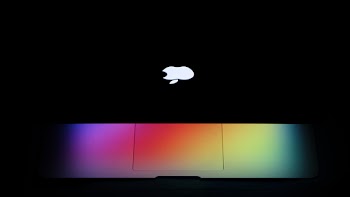 Photograph of Laptop In Dark Area