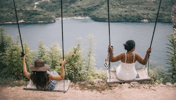 Photograph of Two Girls on a swing