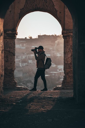 Photographer Capturing Inside Ruins