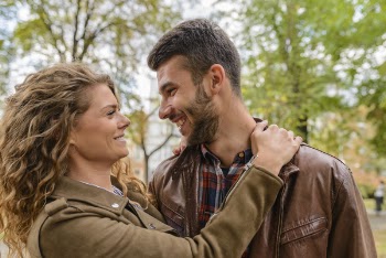 Photography of a Couple Smiling