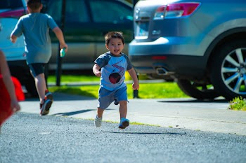 Photography of a Kid Running