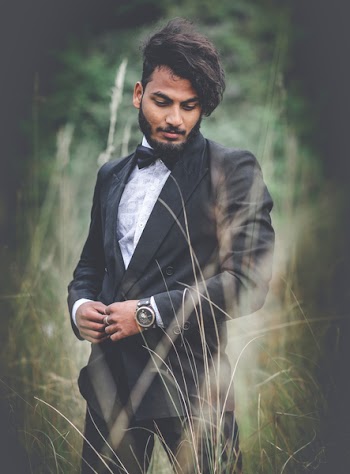Photography of a Man Wearing Black Suit