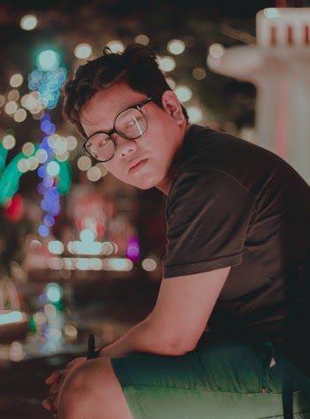 Photography of a Man Wearing Eyeglasses