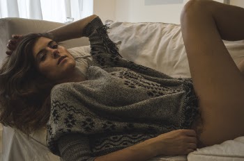 Photography of a Woman Lying on Couch