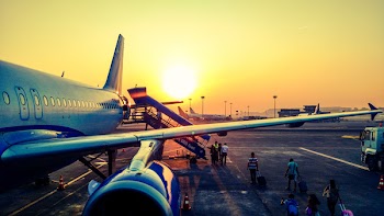 Photography of Airplane during Sunrise